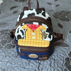 Loungefly Cow Print and Yellow Backpack